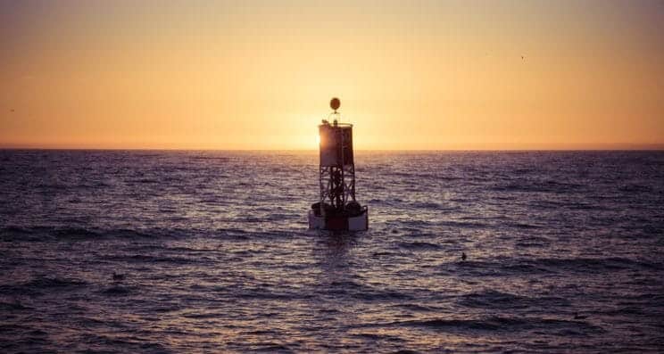 Open Water Navigation. A buoy in open water.