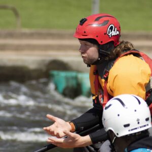 A coach is motivating and teaching. British Canoeing Awarding Body Mentoring eLearning