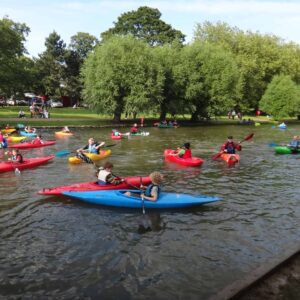 A number of paddlers on the river. Personal Performance Award Provider Refresher eLearning